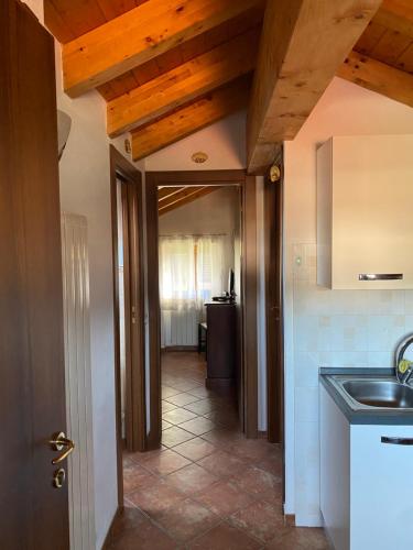 a kitchen with a sink and a counter top at Il Vecchio Noce in Brugnato