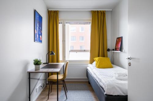 Postel nebo postele na pokoji v ubytování Hiisi Homes Espoo Finnoo