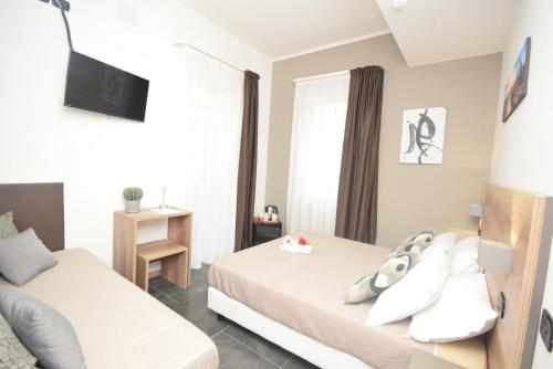 Katil atau katil-katil dalam bilik di Hotel Crisvan