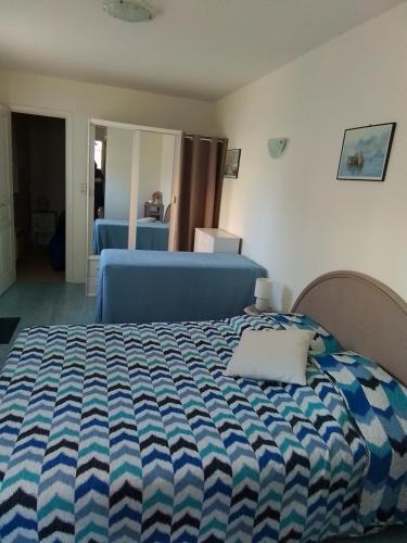 Postel nebo postele na pokoji v ubytování Maison Didonnette Quartier du Parc Royan