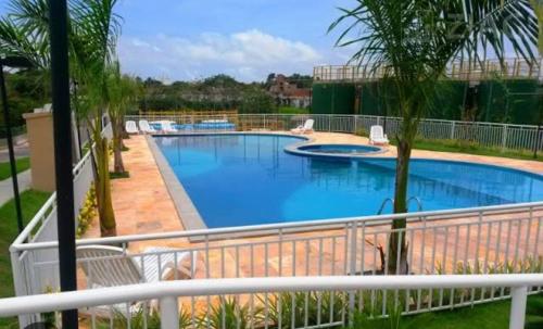 Bazén v ubytování APARTAMENTO CONFORTÁVEL A 900 MTS DA PRAIA DO ARAÇAGY nebo v jeho okolí