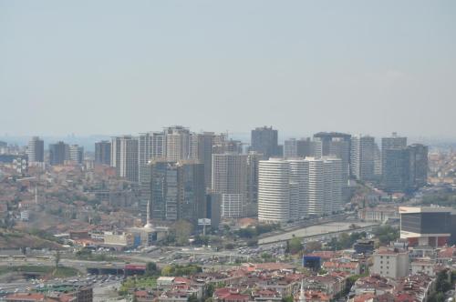a city skyline with tall buildings in the distance at Private Room in Istanbul #109 in Istanbul