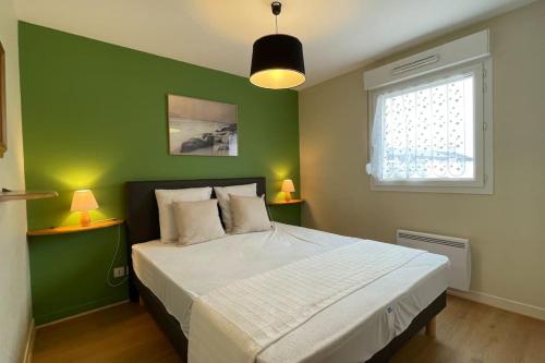 Posteľ alebo postele v izbe v ubytovaní Appartement MerliDunes Proche de la plage