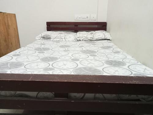 a bed sitting in a room with a mattress at Stylehomes The Farm House Inn (Heritage Resort) in Lokamaleswaram