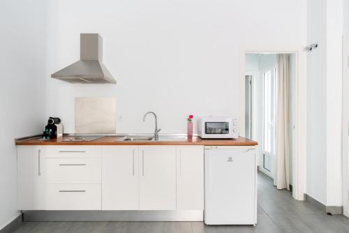 Η κουζίνα ή μικρή κουζίνα στο Sanlúcar Olehousing