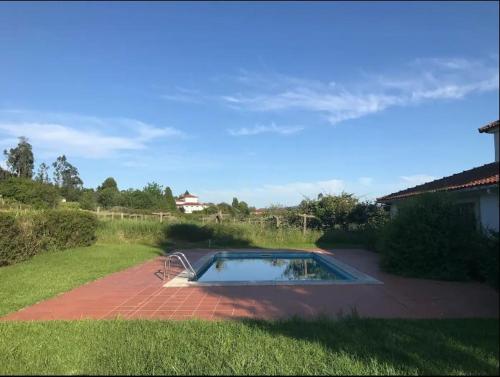 a small swimming pool in a yard at Casa de São Cristóvão - 4r and private swimmingpool in Vila de Punhe