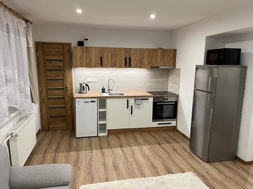 Kuchyň nebo kuchyňský kout v ubytování A&A Apartmany