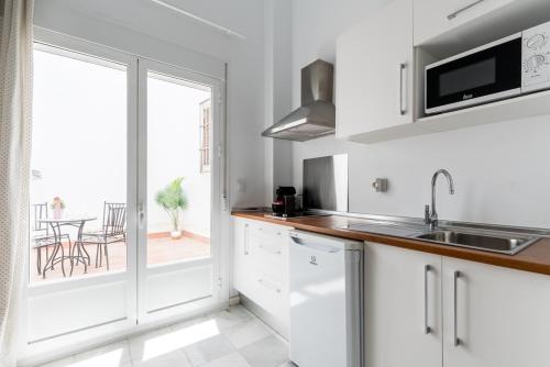 Η κουζίνα ή μικρή κουζίνα στο Sanlúcar Olehousing