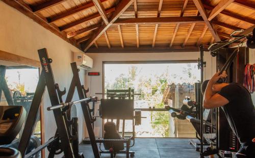 a man working out in a gym at Pousada Vila do Mar in Caraíva