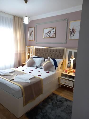 Katil atau katil-katil dalam bilik di Emirhan Guesthouse & Suites