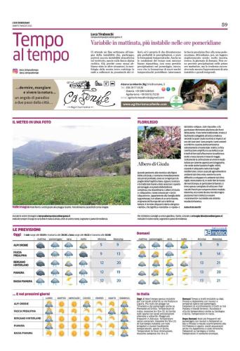 a page of a newspaper with a screenshot of a website at AGRITURISMO CA' FENILE in Alzano Lombardo