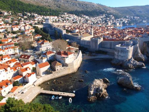 an aerial view of a city and the water at Miró Studio Apartments Dubrovnik in Dubrovnik