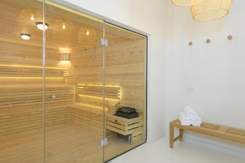 a sauna with a bench in a room at San Lameer Villa 14201 - 5 Bedroom Superior - 10 pax - San Lameer Rental Agency in Southbroom