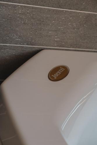 a close up of the top of a white laptop computer at Relax in Pineta in Caldonazzo