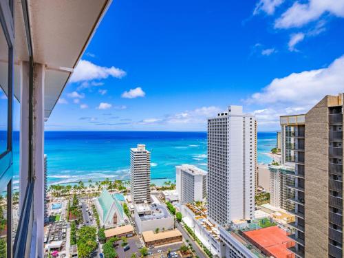 a view of the ocean from a building at Penthouse With Fabulous Ocean View Near Waikiki Beach in Honolulu