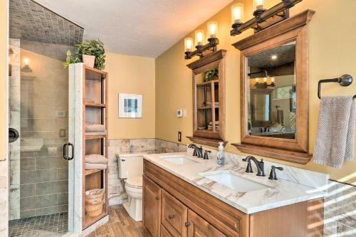 a bathroom with two sinks and a shower at Cozy Home with Sauna Mins to Stowe Mountain Resort in Stowe