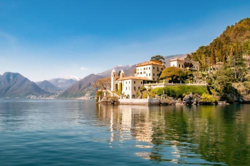 a town on the shore of a body of water at La Terrazza di Como in Como