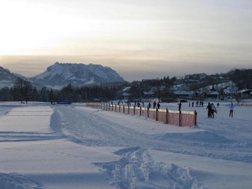 a group of people skiing in the snow at Haus Abendsonne in Reit im Winkl