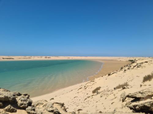a beach in the middle of the desert at Lagon energy dakhla in Dakhla