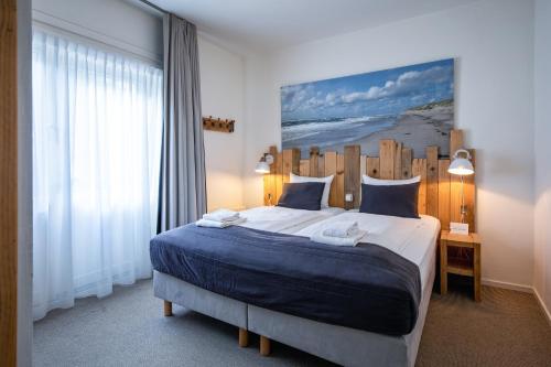 Postel nebo postele na pokoji v ubytování B&B Boutique Hotel De Waal