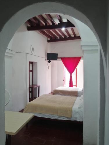 En eller flere senger på et rom på Departamento en Centro de Querétaro