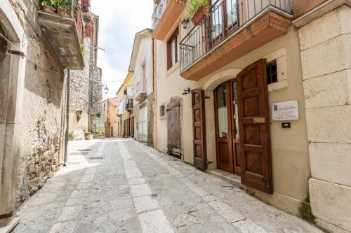 an alley in an old town with buildings at Al Campanaro b&b in Taurasi