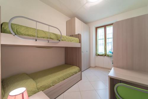 A bed or beds in a room at MIROS APARTMENT