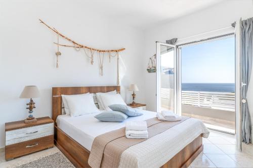 Katil atau katil-katil dalam bilik di Sunday's Seascape By KB Hospitality