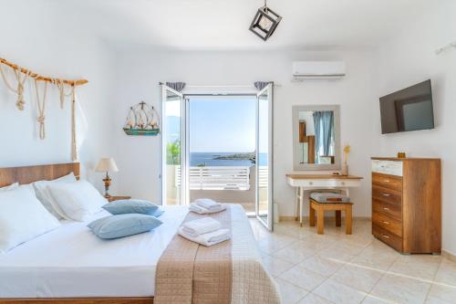 Katil atau katil-katil dalam bilik di Sunday's Seascape By KB Hospitality