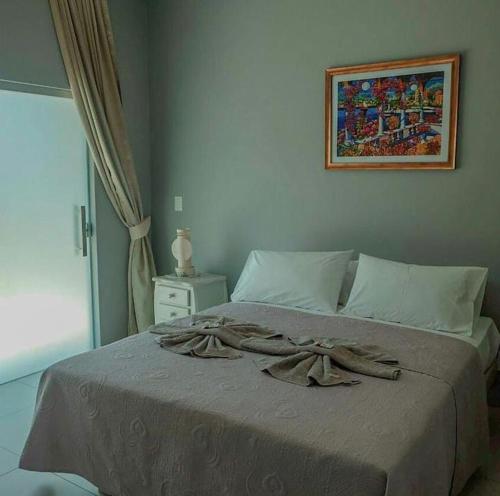 Relais de Charme Boutique Hotel Pititingaにあるベッド