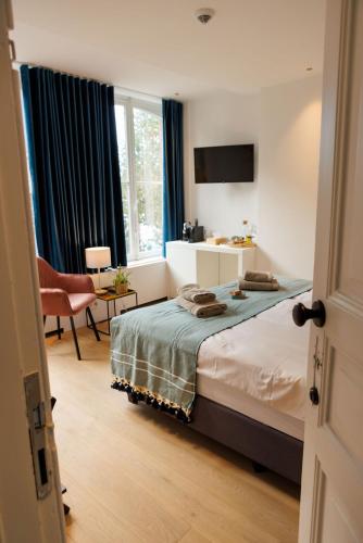 Katil atau katil-katil dalam bilik di APL8 St-Anna B&B