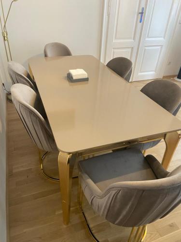 a conference room with a table and chairs at Apartments Opera in Vienna