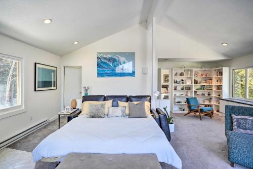a bedroom with a large bed in a room at Lakefront Otis Home with Stunning Views and Boats! in Otis