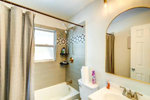 a bathroom with a tub and a toilet and a sink at Beautiful Palatka Vacation Rental with Yard! in Palatka