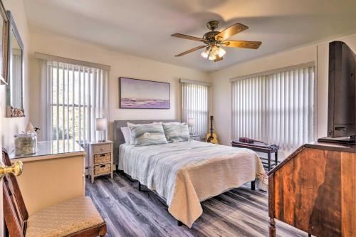 a bedroom with a bed and a ceiling fan at Westerly Vacation Home Town Beach Access in Westerly