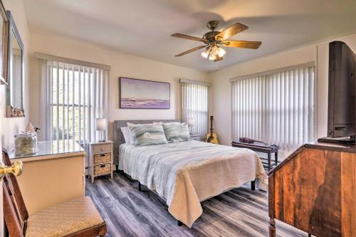 a bedroom with a bed and a ceiling fan at Westerly Vacation Home: Town Beach Access in Westerly