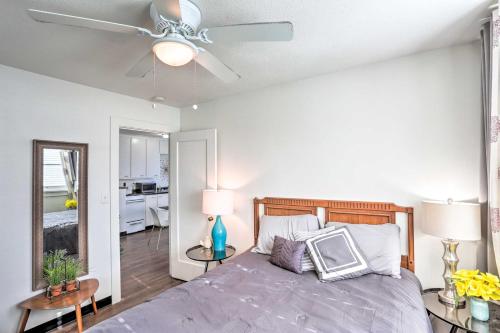 a bedroom with a bed and a ceiling fan at Convenient Lead Vacation Rental! in Lead