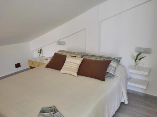 A bed or beds in a room at Villa Lilium
