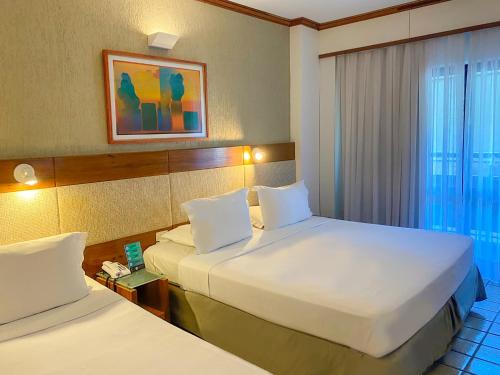 Postel nebo postele na pokoji v ubytování Mar Hotel Conventions