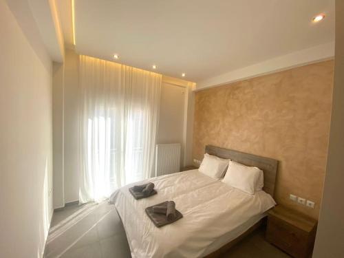 Postel nebo postele na pokoji v ubytování Piraeus Apartment for rent