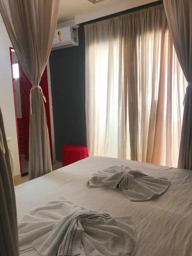 Relais de Charme Boutique Hotel Pititingaにあるベッド