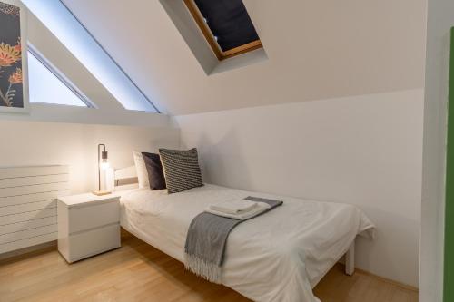 Katil atau katil-katil dalam bilik di Apartments Park Šiška Ljubljana