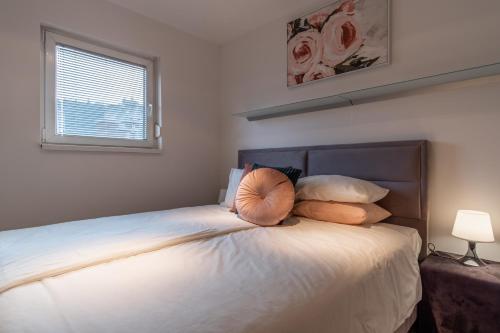 Katil atau katil-katil dalam bilik di Apartments Park Šiška Ljubljana