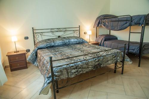 Кровать или кровати в номере B&B La Cannalia