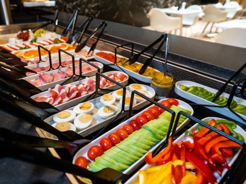 a buffet with many different types of food at Das Flint in Dornbirn