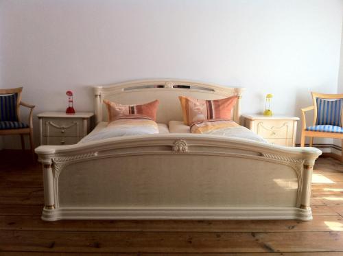 Кровать или кровати в номере City Quartier