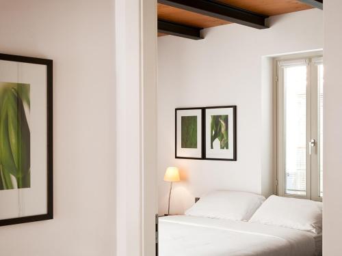 Nenè-Il Vicolo Apartments and Roomsにあるベッド