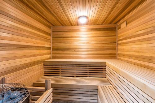 a wooden sauna with a light on the ceiling at Plantation East #1104 in Gulf Highlands
