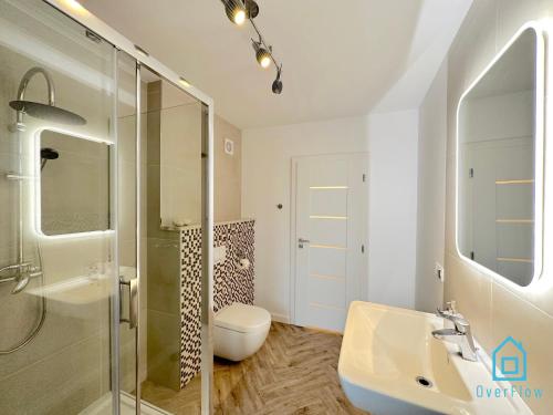 A bathroom at Gdynia Apartment - Borkowo