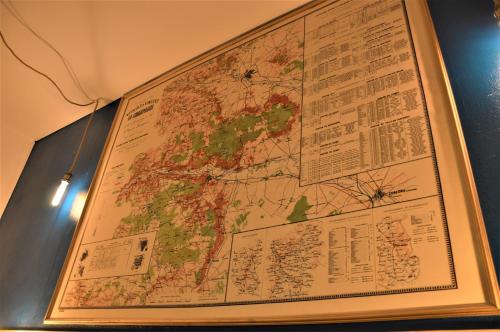 a large map hanging on a wall at Groom Épernay - Le Petit Tonnelier in Épernay